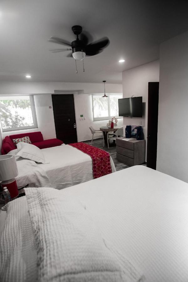 Hotel Paradise Suites Isla Mujeres Bagian luar foto